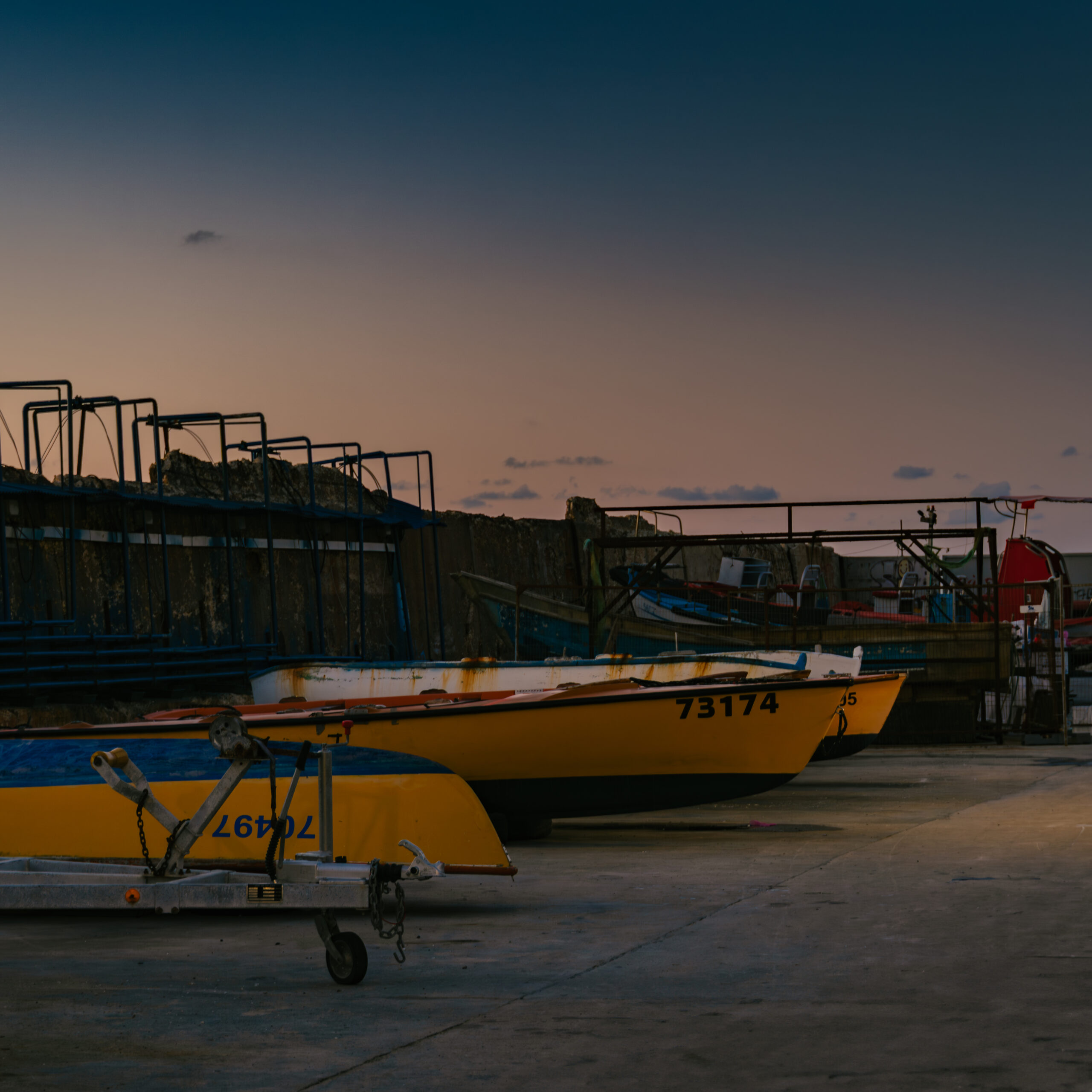 Boats moored in Yafo Port during blue hour in Tel Aviv, Israel.