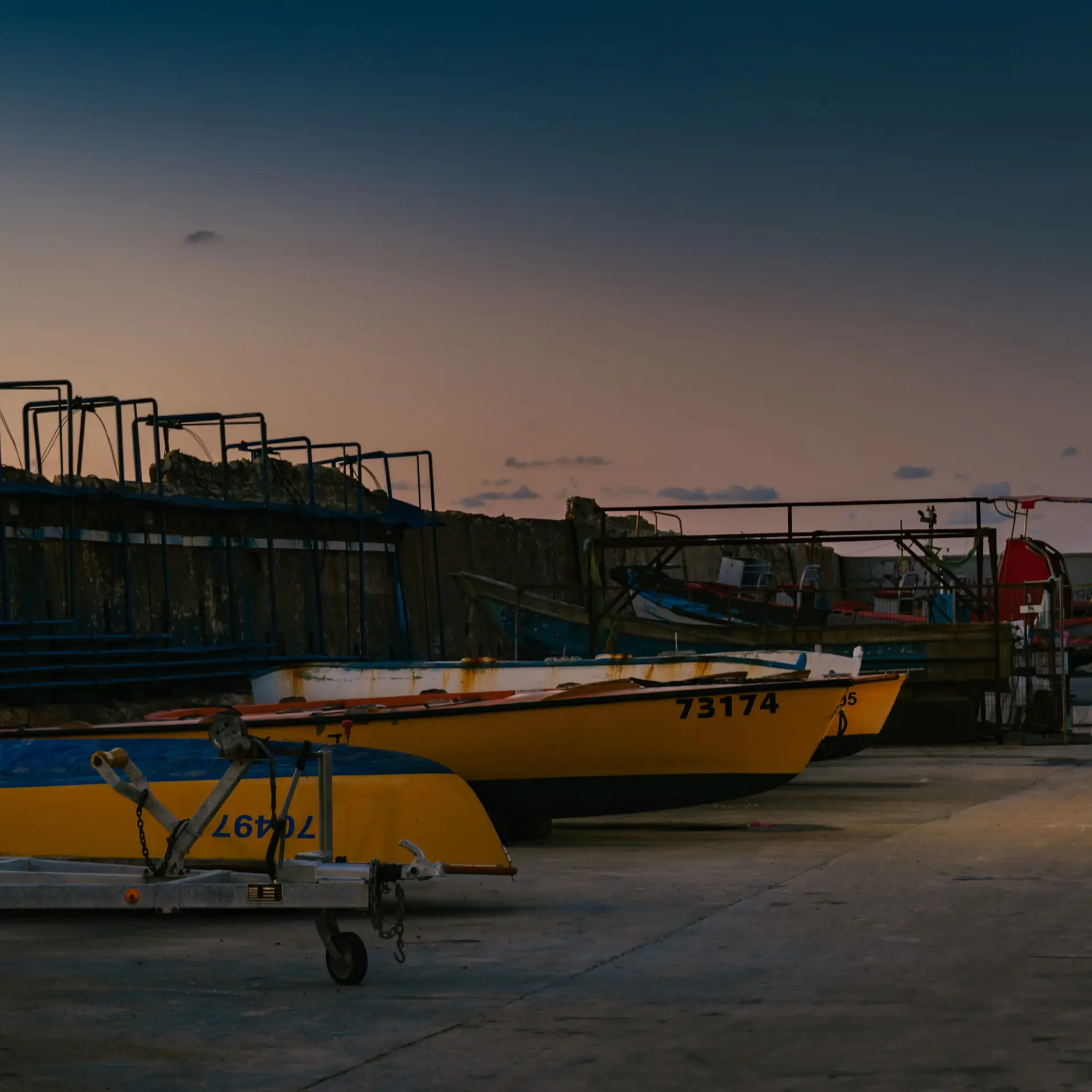 Boats moored in Yafo Port during blue hour in Tel Aviv, Israel.