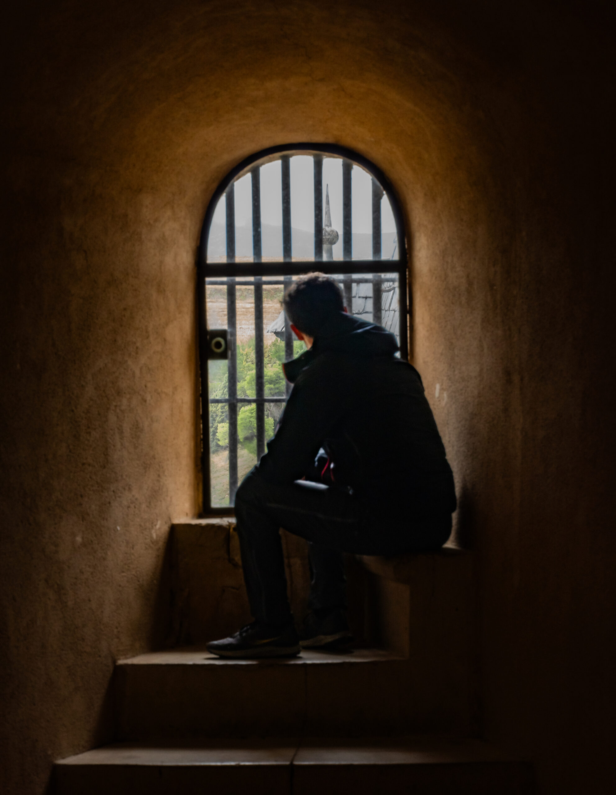 View through a historic window in Segovia, Spain.