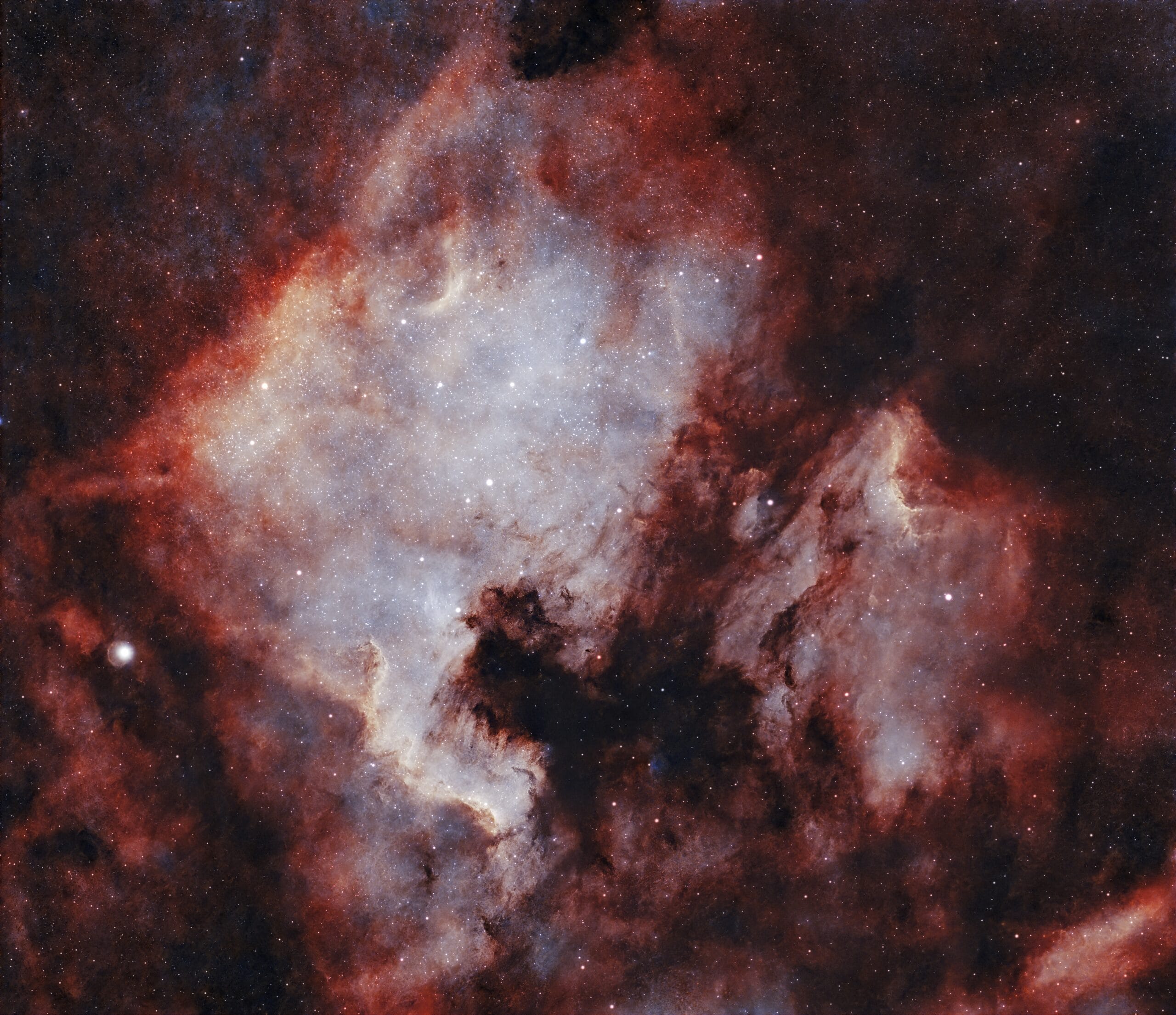 North America Nebula (NGC 7000) and Pelican Nebula (IC 5070) captured as a mosaic, revealing the extensive hydrogen clouds in the Cygnus constellation.